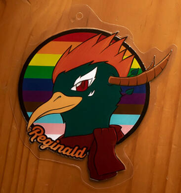 Laminated Reginald Character Badge
